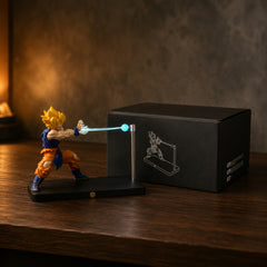 Goku Lamp next to its packaging box on a wooden desk